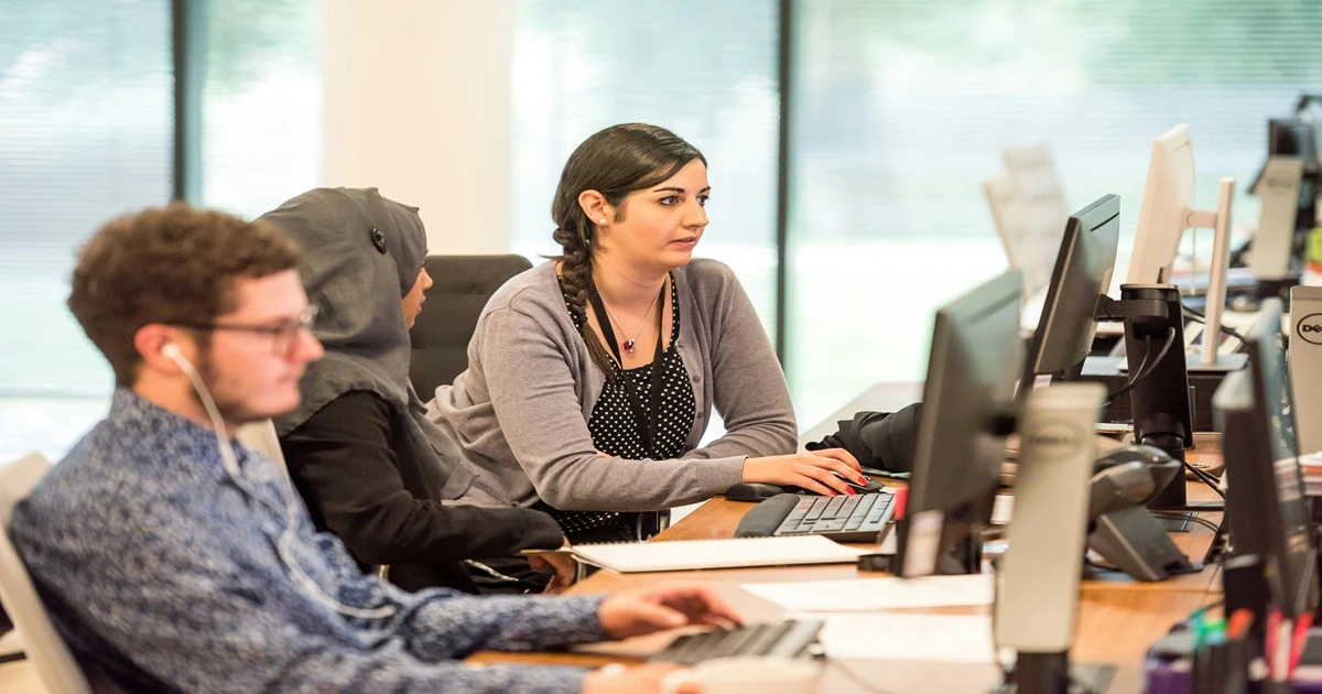 Customer service agents at their desks